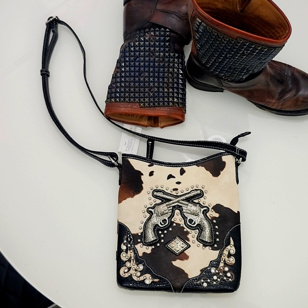NWT Cow hide crossbody bag with pistols
